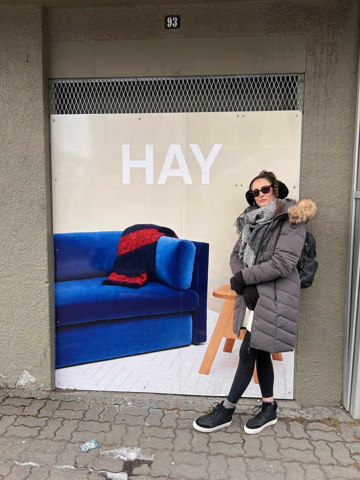 HAY, on a blue sofa mural