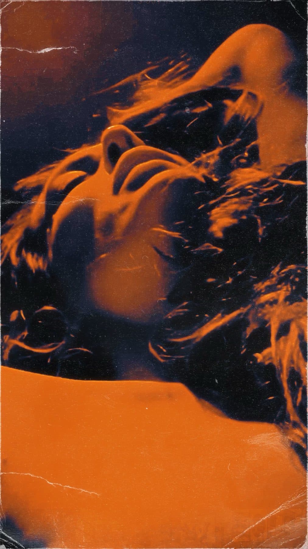 Orange-and-black duotone print, head thrown back, hair in motion.
