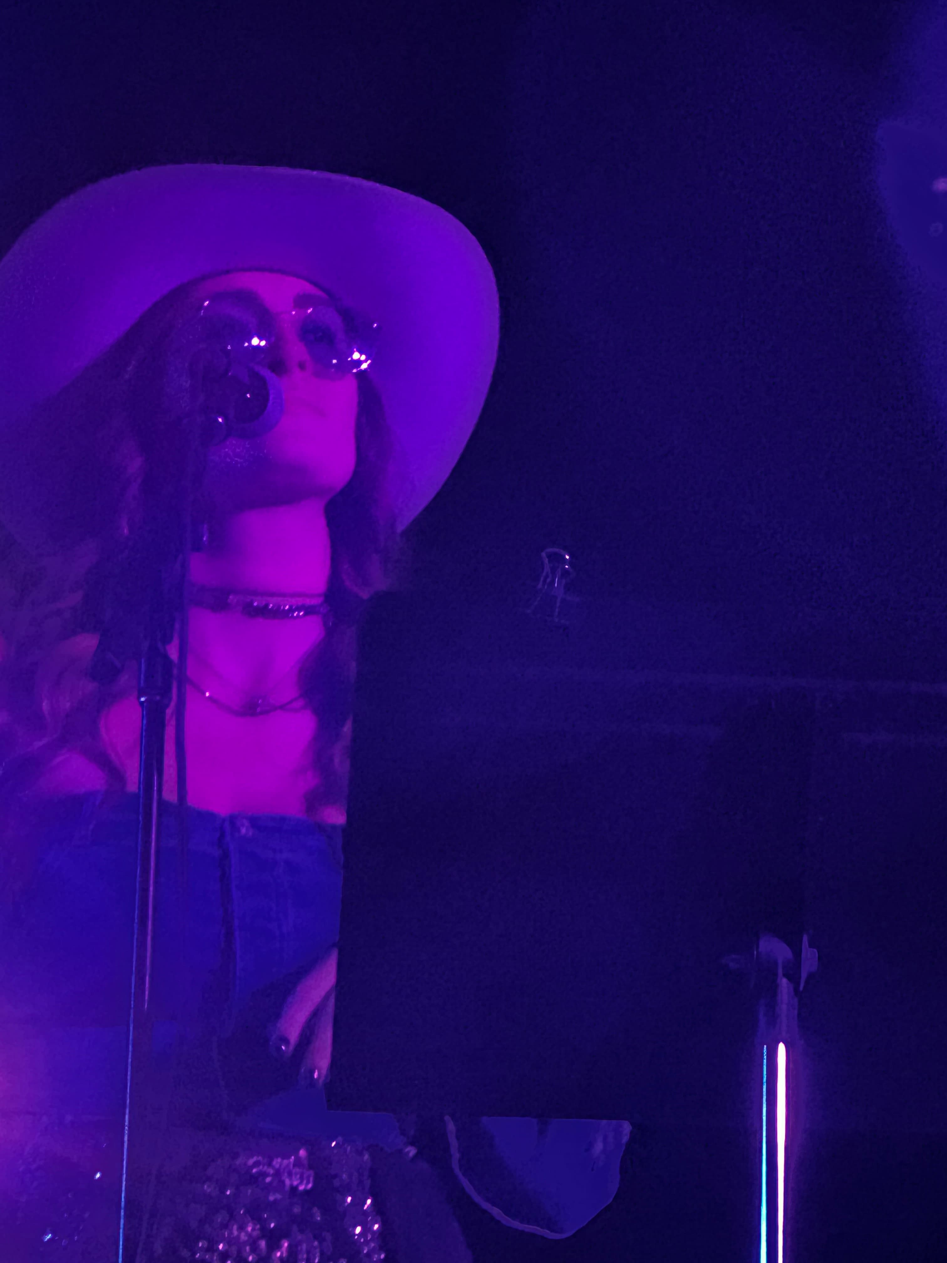On stage, purple lights
