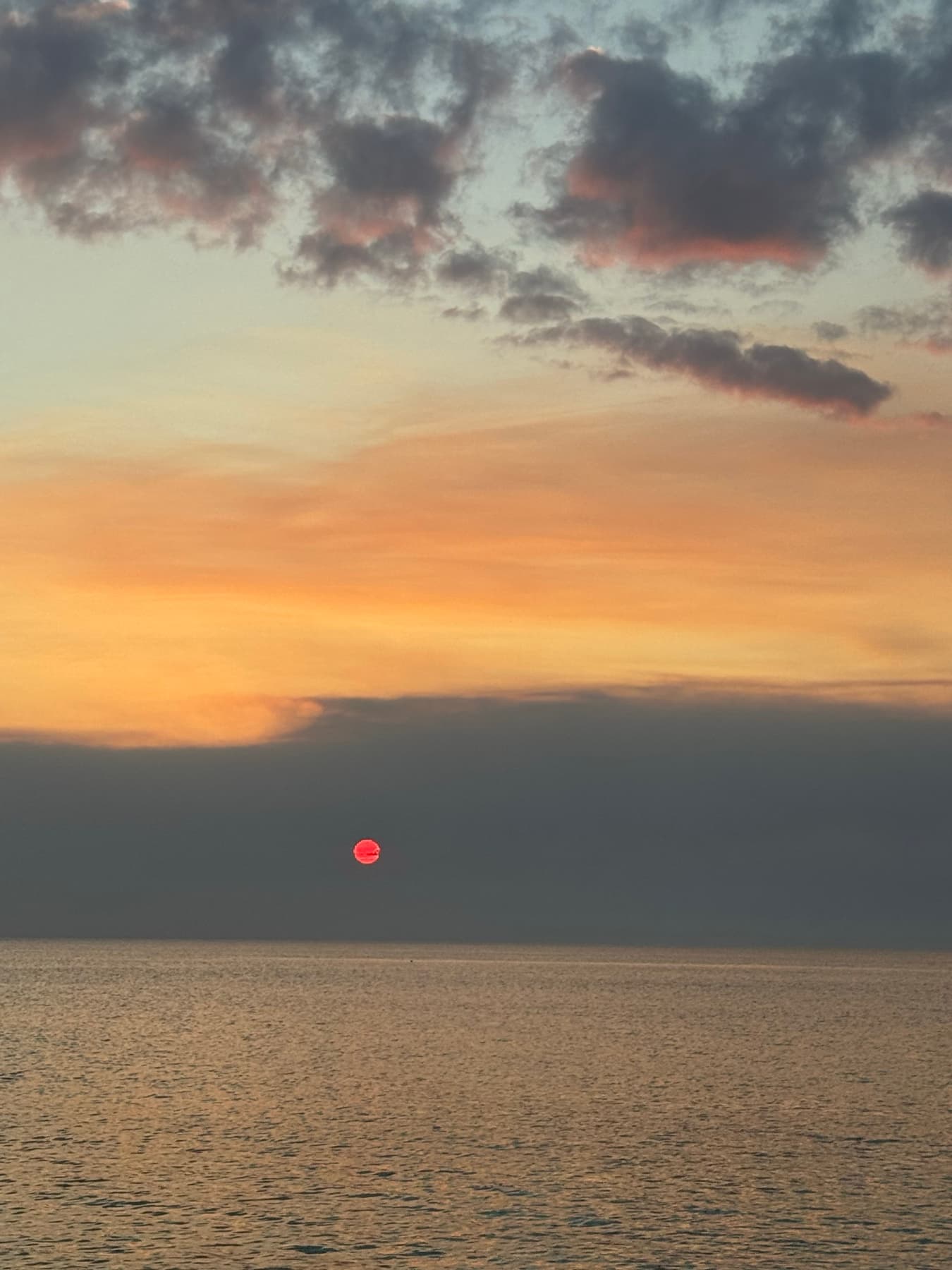 A sky burning orange to blue at last light.