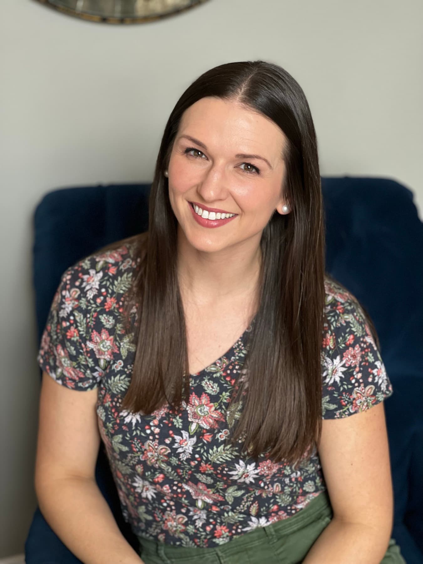 A warm, smiling headshot for a personal brand.