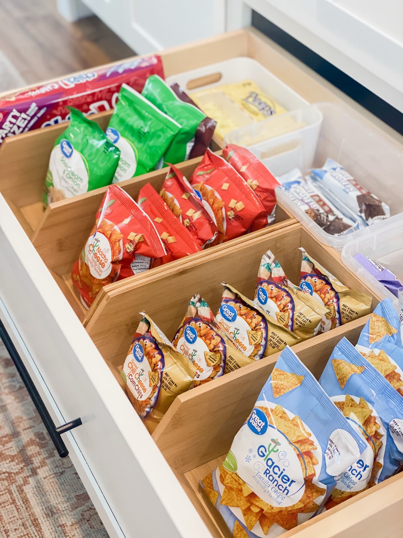 Pull-out pantry drawers stocked and faced.